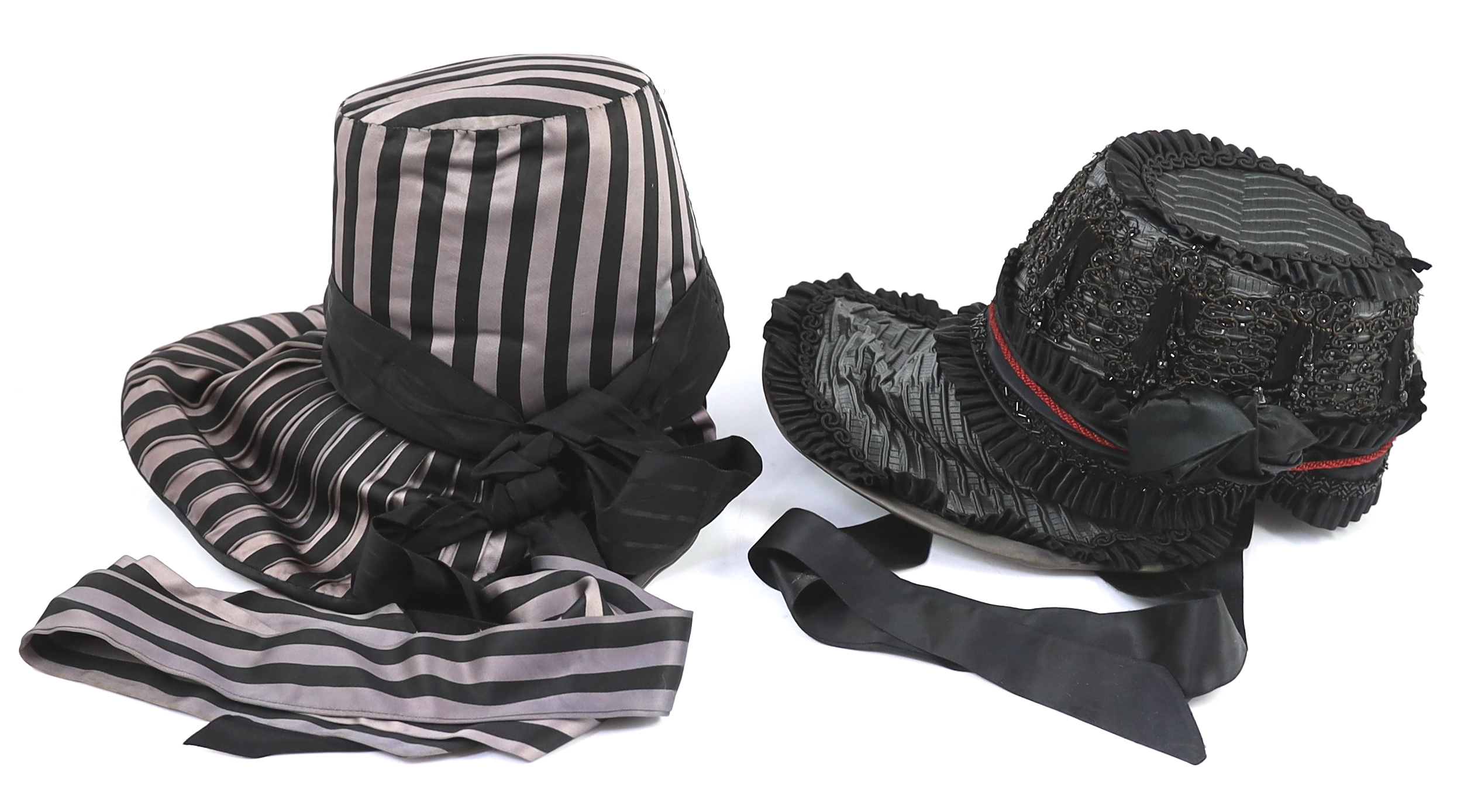 Two lady's Victorian style bonnets, silver and black striped and the other silver black with jet trim. Ex Royal Opera House 'The Damnation of Faust'
